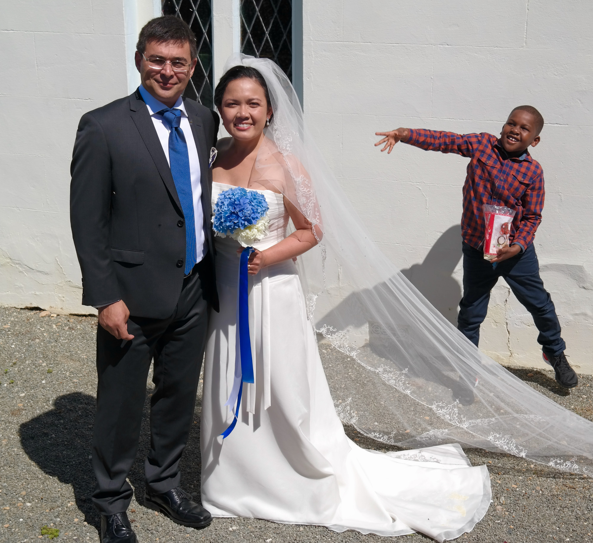 wedding couple in front of church